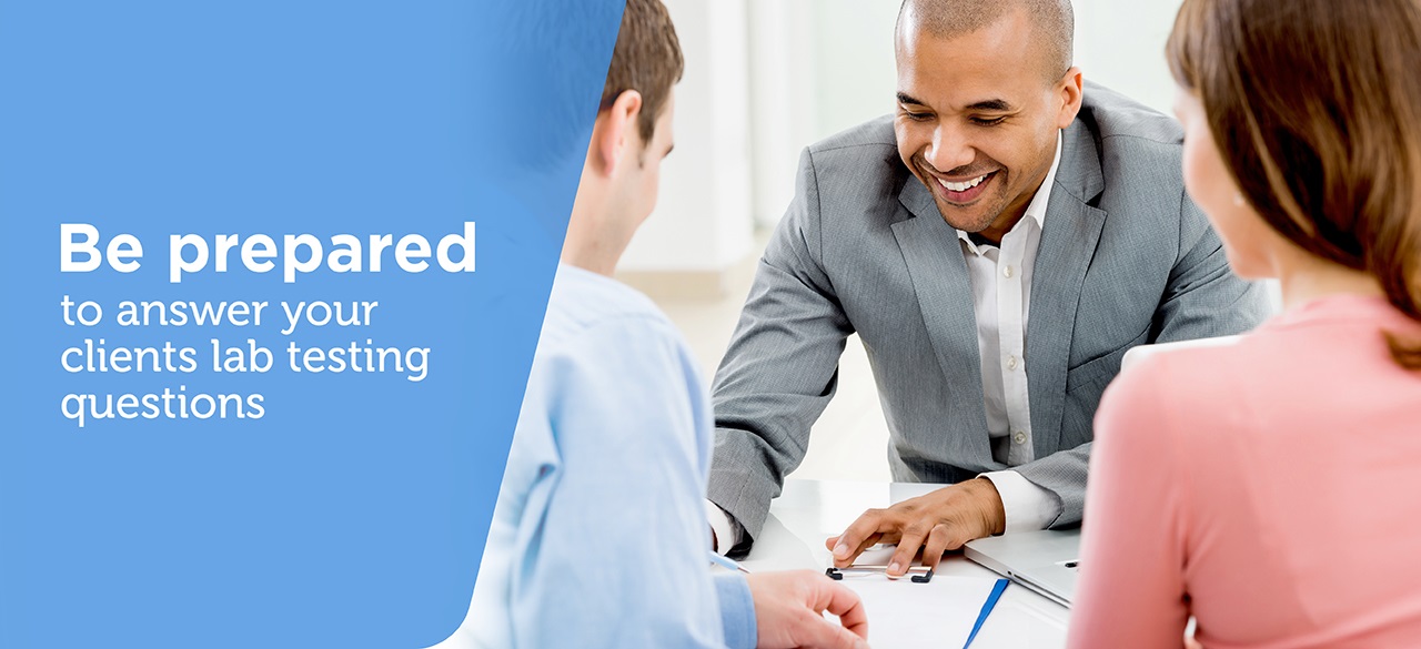 Couple speaking with a business professional looking at a clipboard
