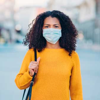 Young lady wearing a mask
