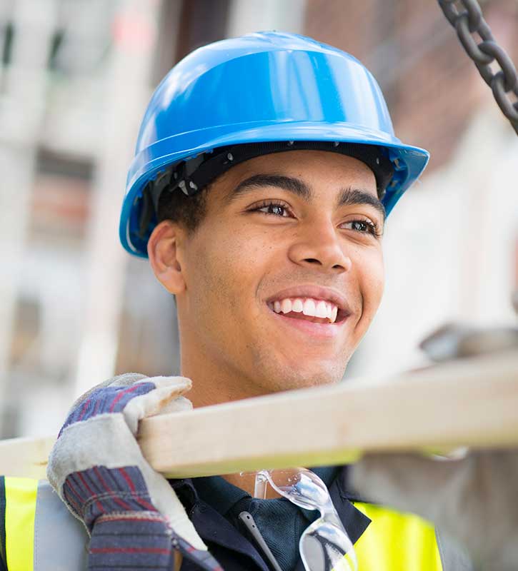 Young man wearing a hard hat